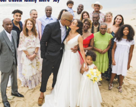 Life’s a beach: The guests gather around the loved-up couple. “You realise what’s important on the day – and that’s having the people around you who love you for who you are,” says Lisa