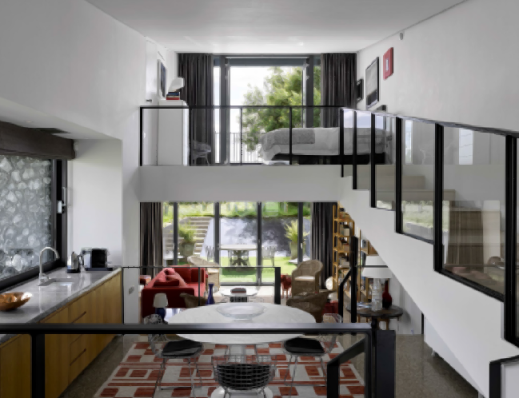 An integrated living space for guests at Flint House, Waddesdon, Buckinghamshire, designed by Skene Catling de la Peña in 2015.